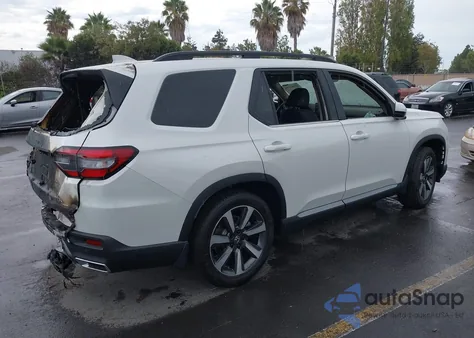 2025 Honda Pilot Touring z USA, uszkodzony, nr VIN 5FNYG1H71SB153061